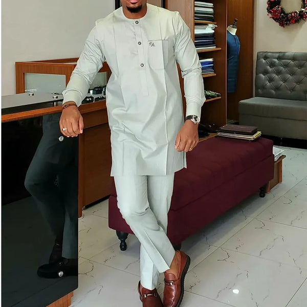 Men's African-inspired casual set featuring intricate patchwork panels and comfortable relaxed fit