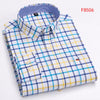 Oxford Confidence Shirt in striped pattern, adding a modern twist.
