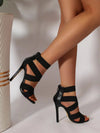 Sophisticated burgundy stiletto heels with durable rubber outsole for comfort.