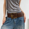 Vintage wide belt for women in faux leather with metal buckle, perfect for casual or formal wear in black, brown, or red.