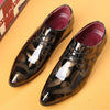 Elegant floral men's Oxford dress shoes in black with a lace-up closure.