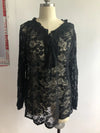 Elegant Boho Lace V-Neck Blouse for women, featuring delicate lace, relaxed fit, and lightweight fabric for casual sophistica