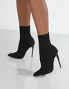 Sophisticated sock ankle boots with super high thin heel and cozy knit construction