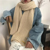Elegant unisex chunky knit scarf, perfect for travel and everyday wear.