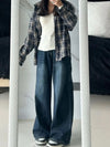 Y2K high-waist straight leg baggy jeans in medium wash denim with classic zipper fly