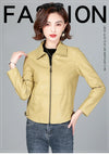Chic women's sheepskin leather jacket with zippered front, turn-down collar, and pockets for stylish autumn layering.