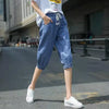 Effortless harem jeans in calf-length with elastic high waist and relaxed silhouette