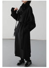 Timeless wool trench coat with defining belt and extended coverage