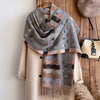 Cozy accessory draped over a chair, showcasing its soft texture and warmth.