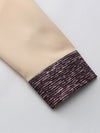 Traditional African-inspired patchwork shirt and pants ensemble in breathable polyester fabric