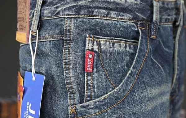 Men's vintage wash jeans, a versatile addition to any wardrobe.
