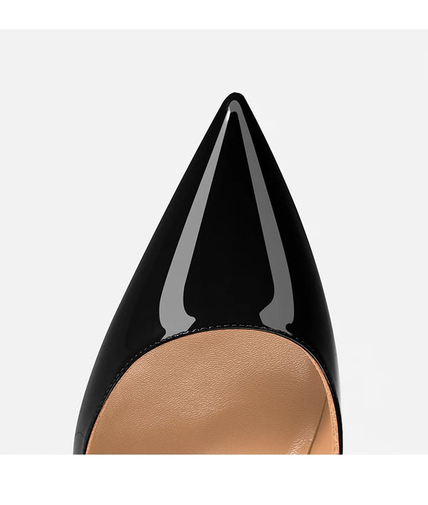 Black leather party pumps with dramatic stiletto heel and pointed toe