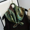 Versatile green scarf styled as a chic necktie, made from high-quality polyester.
