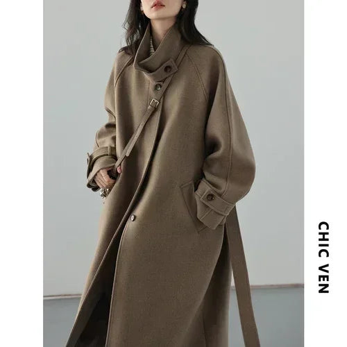 Classic woolen outerwear with adjustable belt and refined collar detail