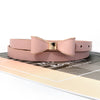 Elegant women's belt with bow detail in premium faux leather, perfect for casual and formal outfits, featuring a metal buckle