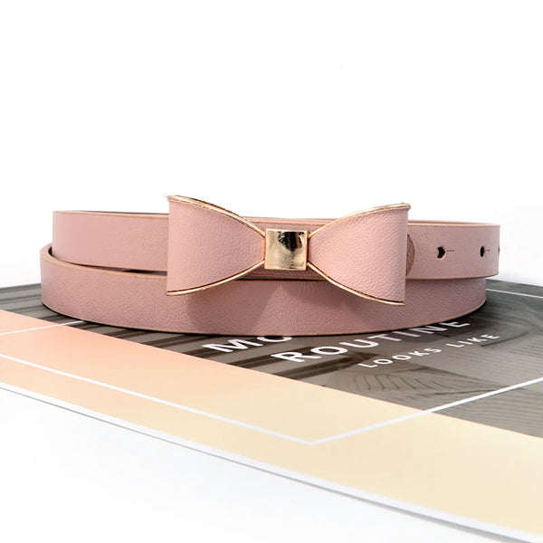 Elegant women's belt with bow detail in premium faux leather, perfect for casual and formal outfits, featuring a metal buckle