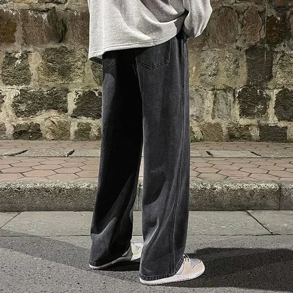 Men's everyday jeans in softened denim with relaxed straight wide-leg silhouette