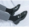 Microfiber upper of formal oxfords for a polished finish.