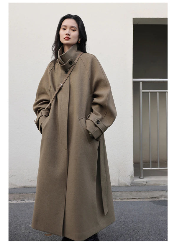 Elegant trench coat featuring premium wool blend and flattering belt