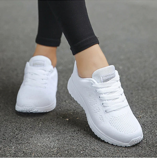 Women's white casual sneakers with colorful accents and cushioned insole