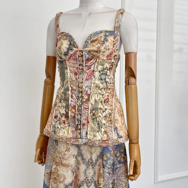 Close-up of the delicate floral print on the backless linen midi dress, showcasing vintage glamour.