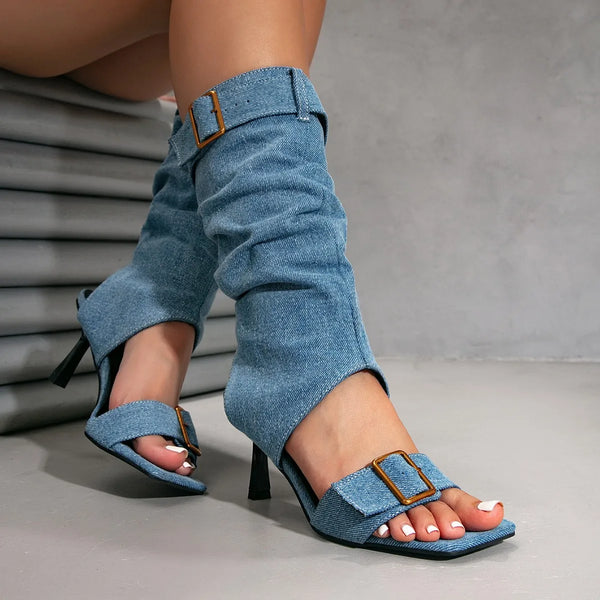 Fashion-forward mid-calf boots combining casual denim with luxe suede material