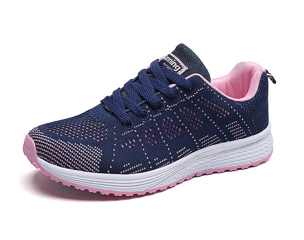Lightweight white athletic shoes featuring playful colorful details
