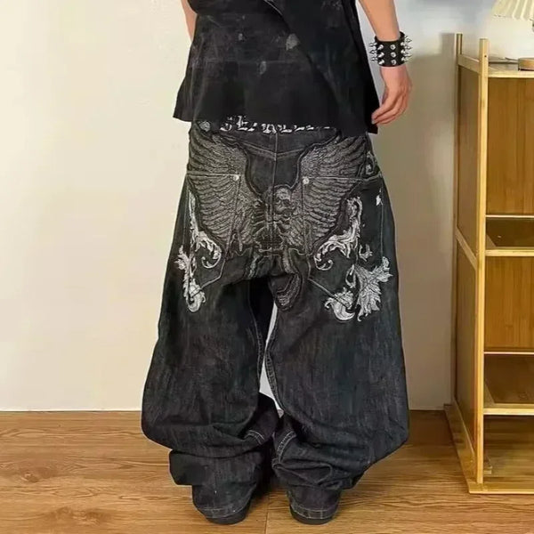 Casual blue jeans with artistic embroidery, perfect for any outfit.
