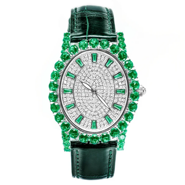 Emerald Luxe Watch with diamond bezel and green gemstone on a leather strap.