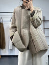 Khaki quilted cotton jacket with button-front closure and regular fit displayed on white background