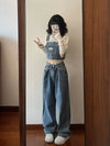 High-waist vintage denim straight-leg jeans for women, featuring a flattering fit and lightweight, durable fabric.
