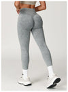 Maroon seamless high waist leggings for active women.