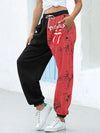 Chic high-waist joggers with 3D geometric print, pockets, and elastic drawstring for comfort and style in any season.