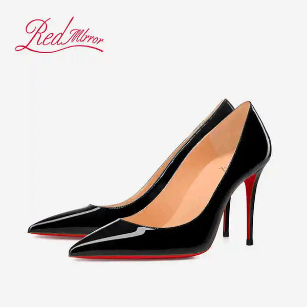 Classic black stilettos with pointed toe perfect for formal celebrations