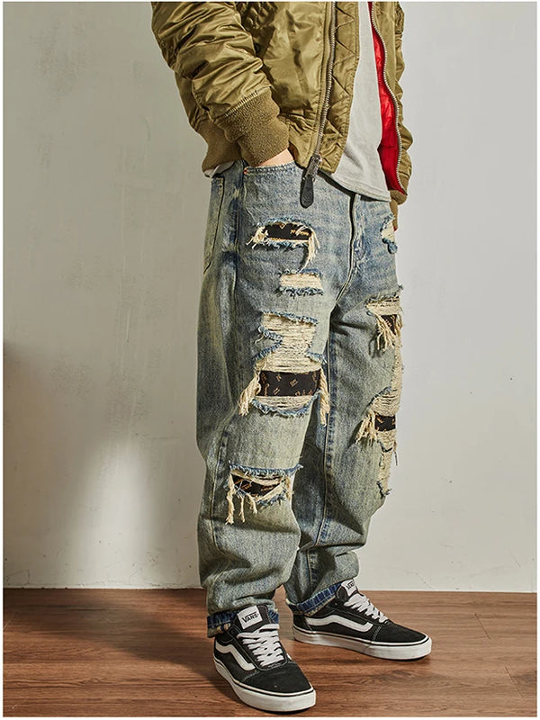 Front view of Rebel Spirit Distressed Jeans, highlighting the timeless style and rugged refinement.
