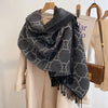 Winter Whisper cashmere shawl in soft cream with playful fringes for cozy elegance.