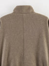 Women's autumn outerwear featuring adjustable belt and elegant turtleneck collar