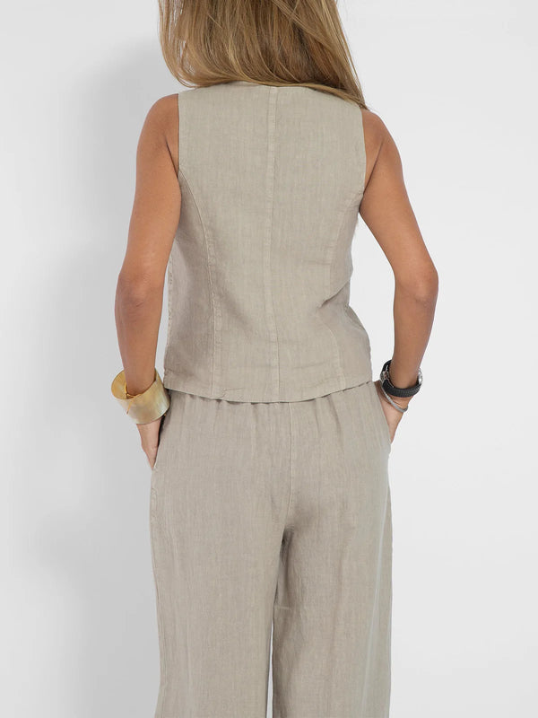 Close-up of the fabric drape on the Radiant Summer Suit, emphasizing breathability.