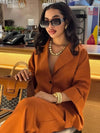 Model wearing the Chic Command Set, showcasing the elegant silhouette and flattering fit.