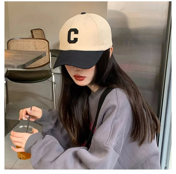 Adjustable strap on Sunlit Days cap for a secure fit.