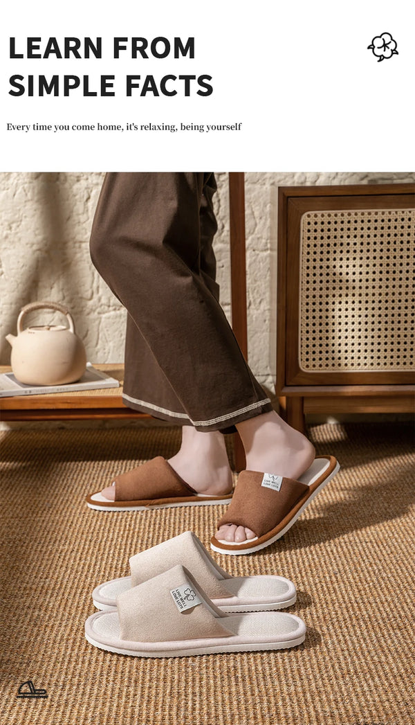 Woman relaxing at home wearing comfortable breathable linen slippers