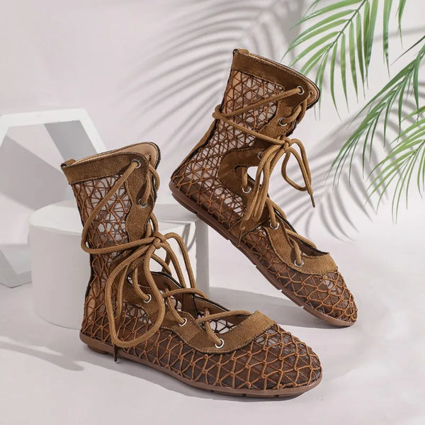 Versatile mesh ankle boots combining athletic comfort with classic lace-up boot styling