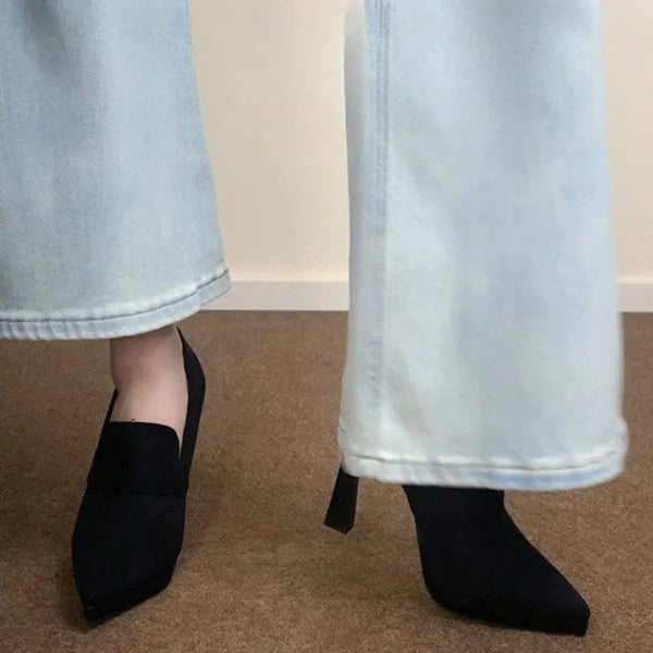 Non-slip rubber outsole on stylish suede heels, perfect for parties and formal events.