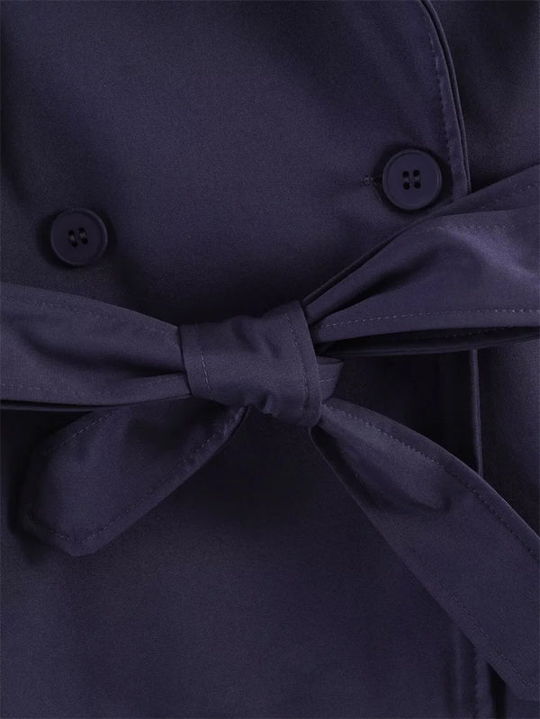 Spring trench coat with tie waist and timeless button closure