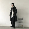 Chic Japanese vintage trench coat for men in black, perfect for autumn and winter travel with a stylish turn-down collar.