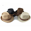 Elegant straw fedora showcasing a classic design for men and women.
