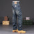 Men's vintage wash straight jeans with pockets, crafted from premium denim.