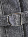 Autumn outerwear with zip-front and belt creating flattering shape on model