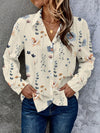 Elegant floral print women's blouse with batwing sleeves, perfect for everyday wear and versatile styling options.
