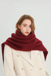 Versatile long shawl in soft beige, ideal for winter fashion.